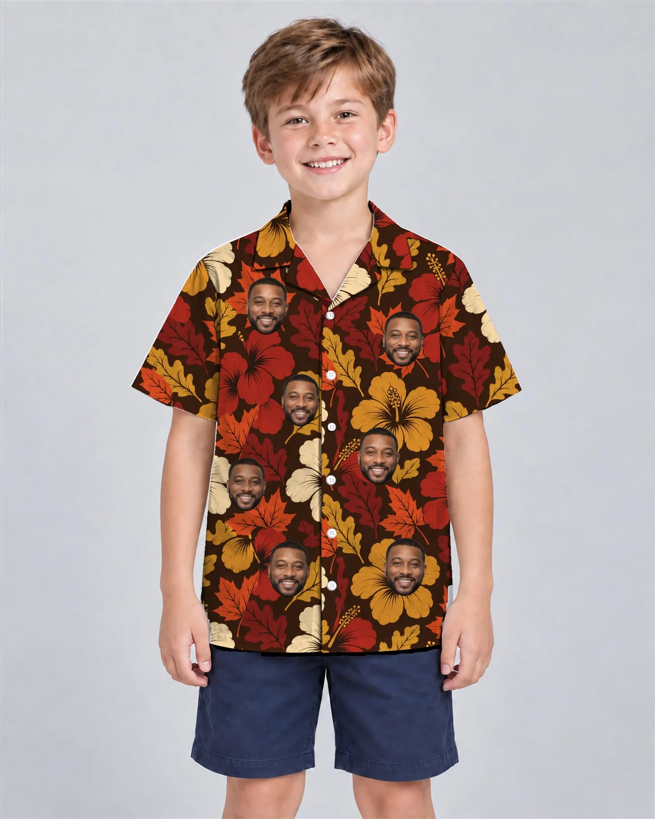 Kid wearing the Autumn Leaves Hibiscus Thanksgiving Hawaiian Shirt with custom faces Kid wearing the Autumn Leaves Hibiscus Thanksgiving Hawaiian Shirt with custom faces