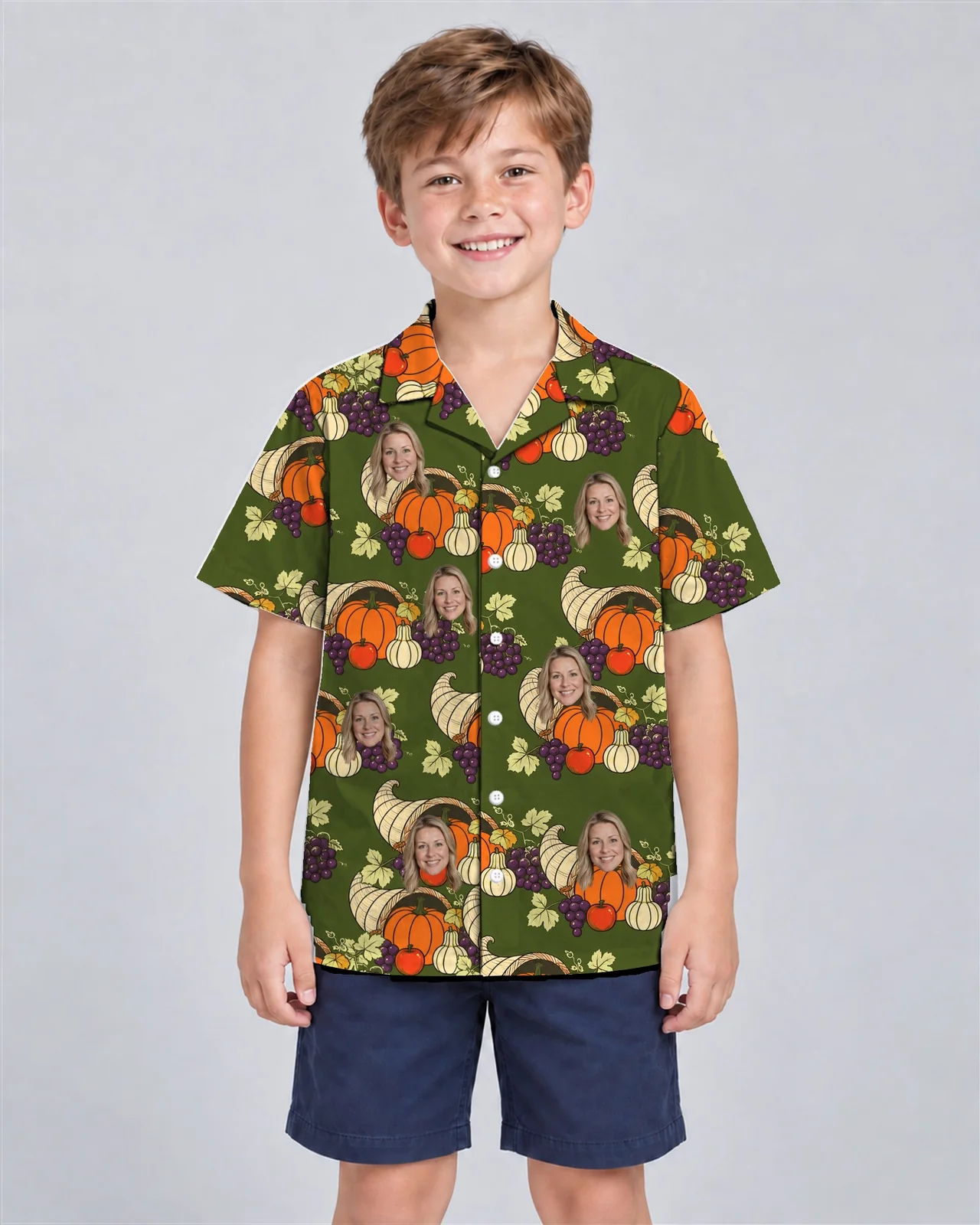 Kid wearing the Cornucopia Harvest Thanksgiving Hawaiian Shirt with custom faces Kid wearing the Cornucopia Harvest Thanksgiving Hawaiian Shirt with custom faces