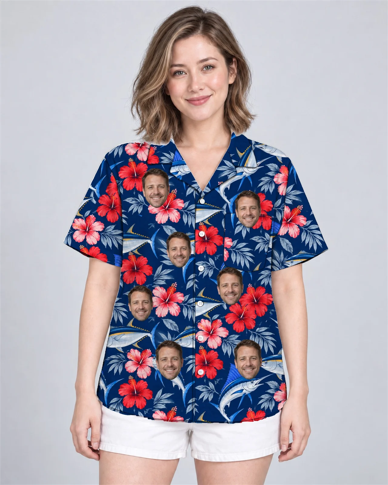 Woman wearing the Fish & Hibiscus Hawaiian Shirt with custom faces Woman wearing the Fish & Hibiscus Hawaiian Shirt with custom faces