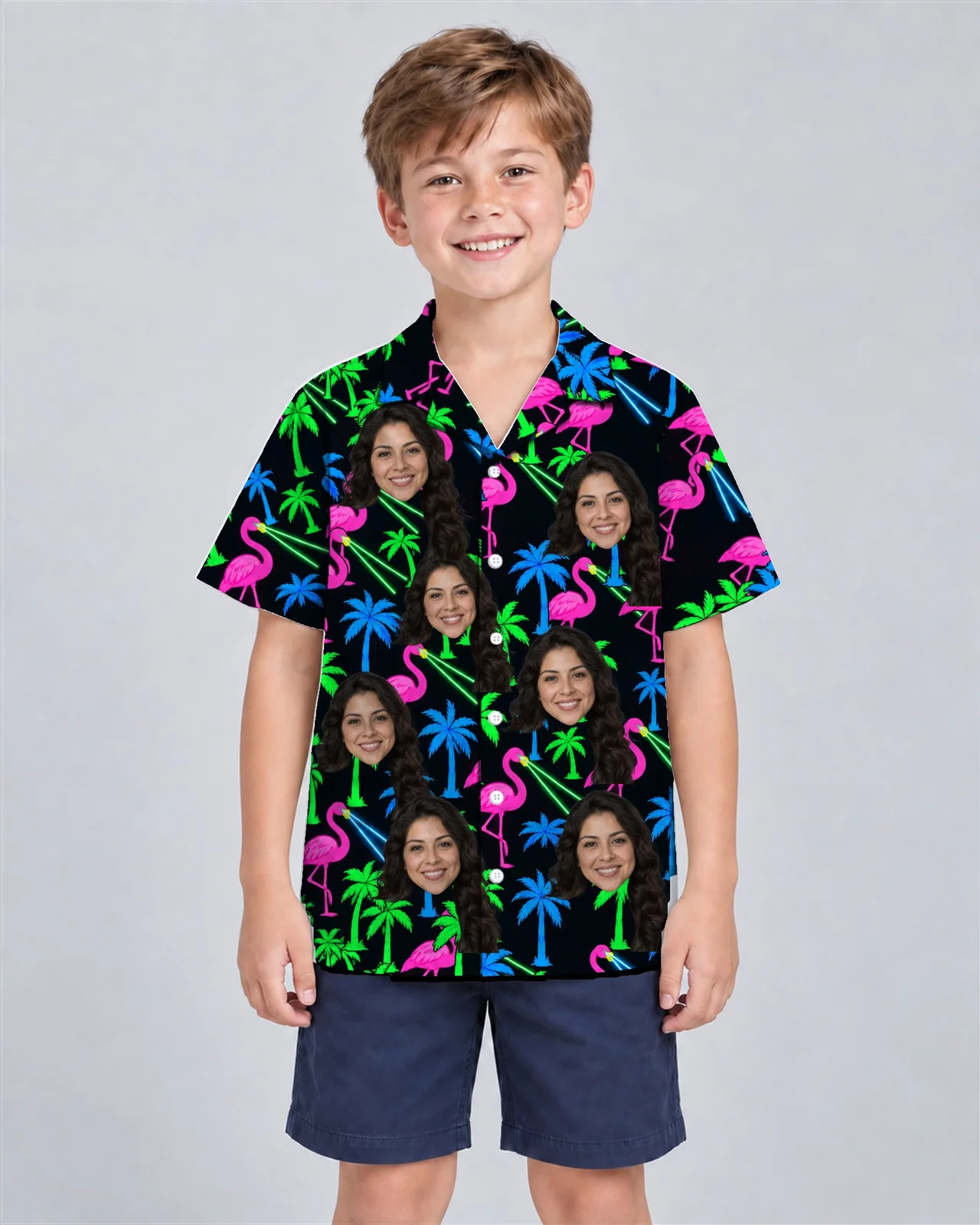 Kid wearing the Neon Flamingo Ugly Hawaiian Shirt with custom faces Kid wearing the Neon Flamingo Ugly Hawaiian Shirt with custom faces