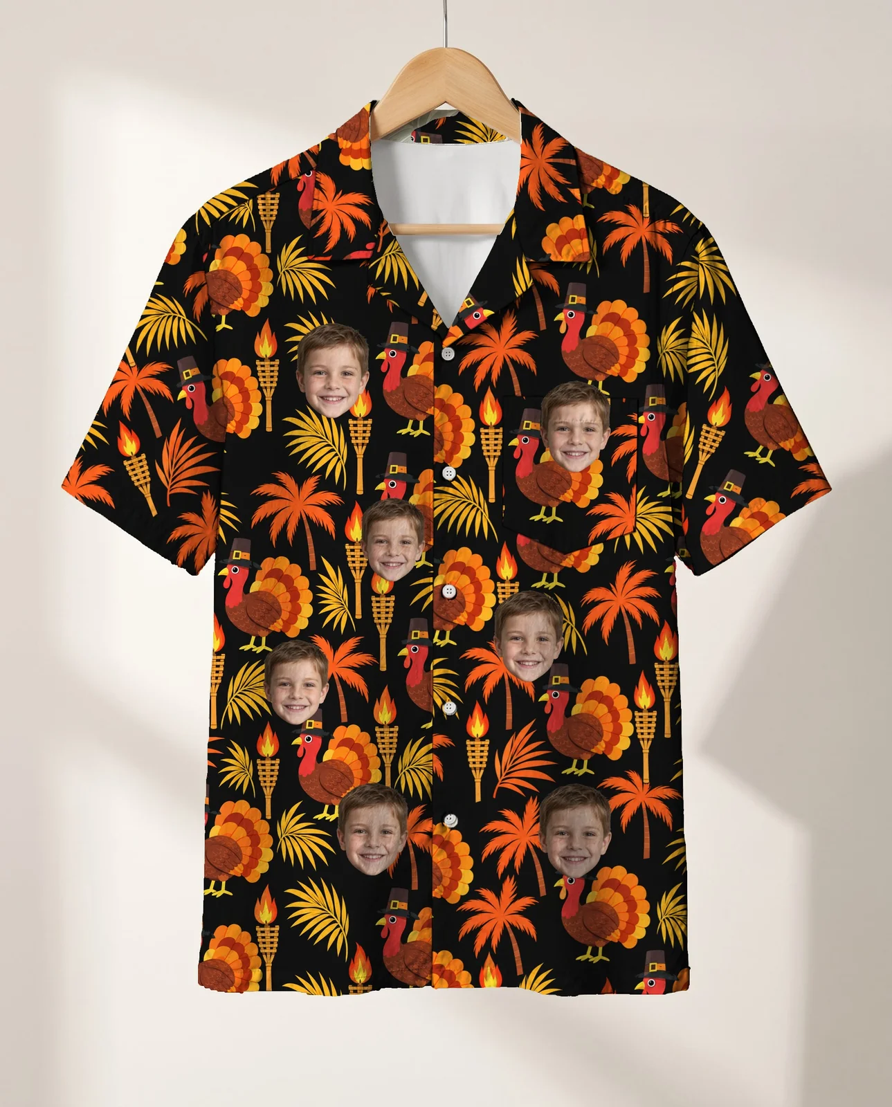 Pilgrim Turkey Tiki Thanksgiving Hawaiian Shirt personalized with faces, on a hanger Pilgrim Turkey Tiki Thanksgiving Hawaiian Shirt personalized with faces, on a hanger