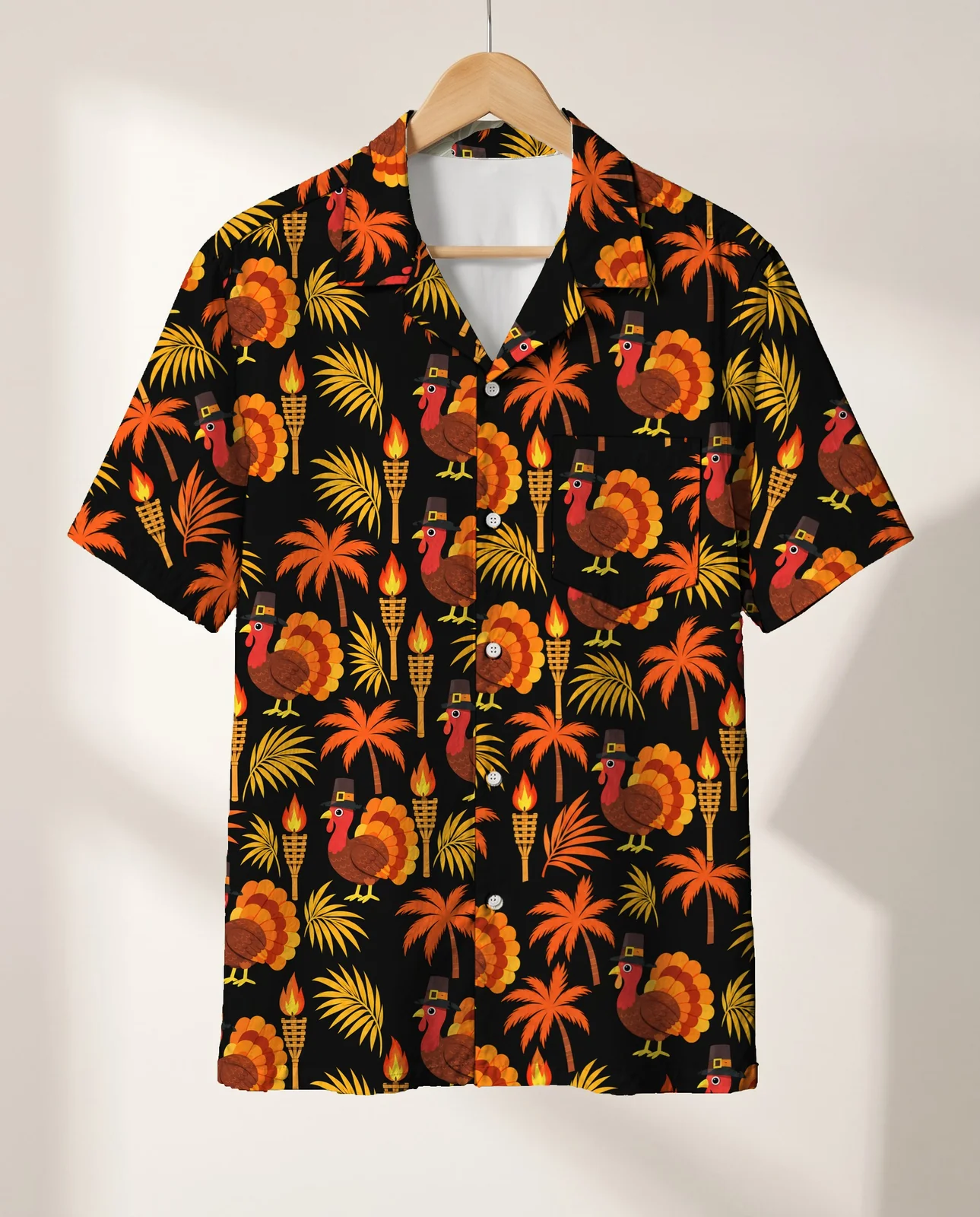 Pilgrim Turkey Tiki Thanksgiving Hawaiian Shirt on a hanger Pilgrim Turkey Tiki Thanksgiving Hawaiian Shirt on a hanger