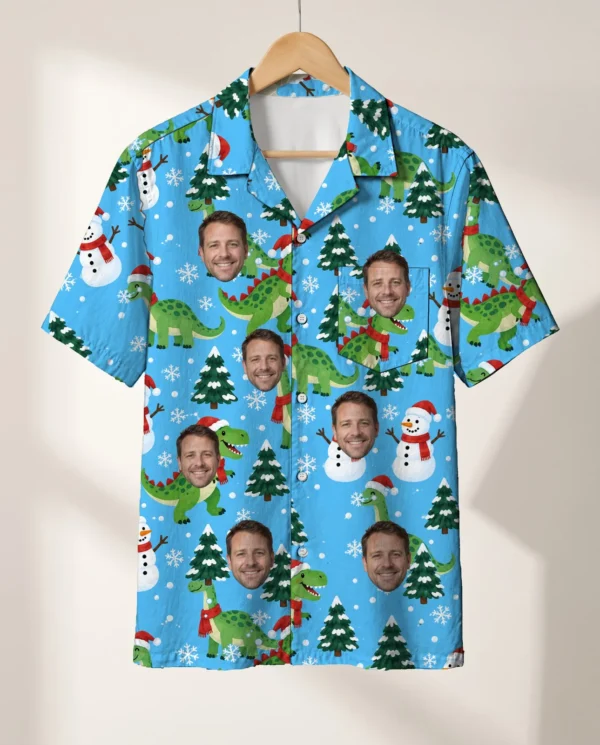 Snowy Dino Christmas Hawaiian Shirt personalized with faces, on a hanger