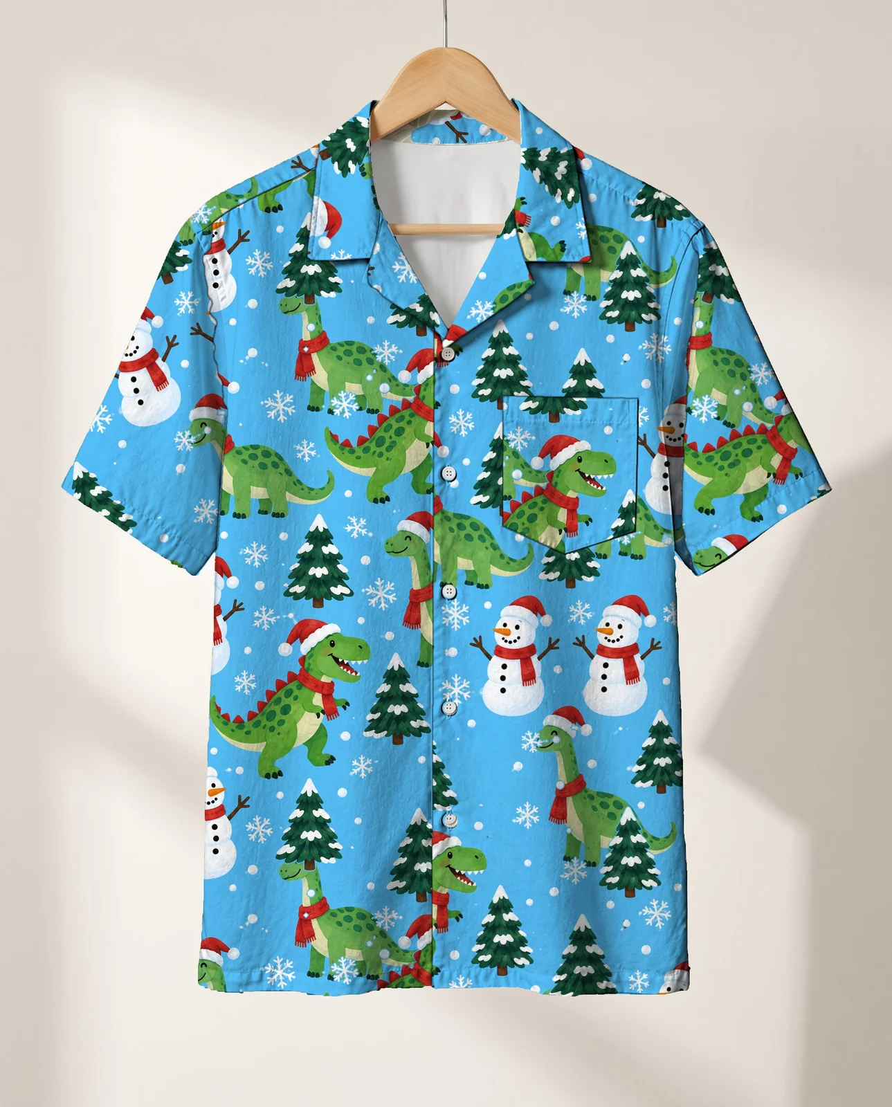 Snowy Dino Christmas Hawaiian Shirt on a hanger Snowy Dino Christmas Hawaiian Shirt on a hanger