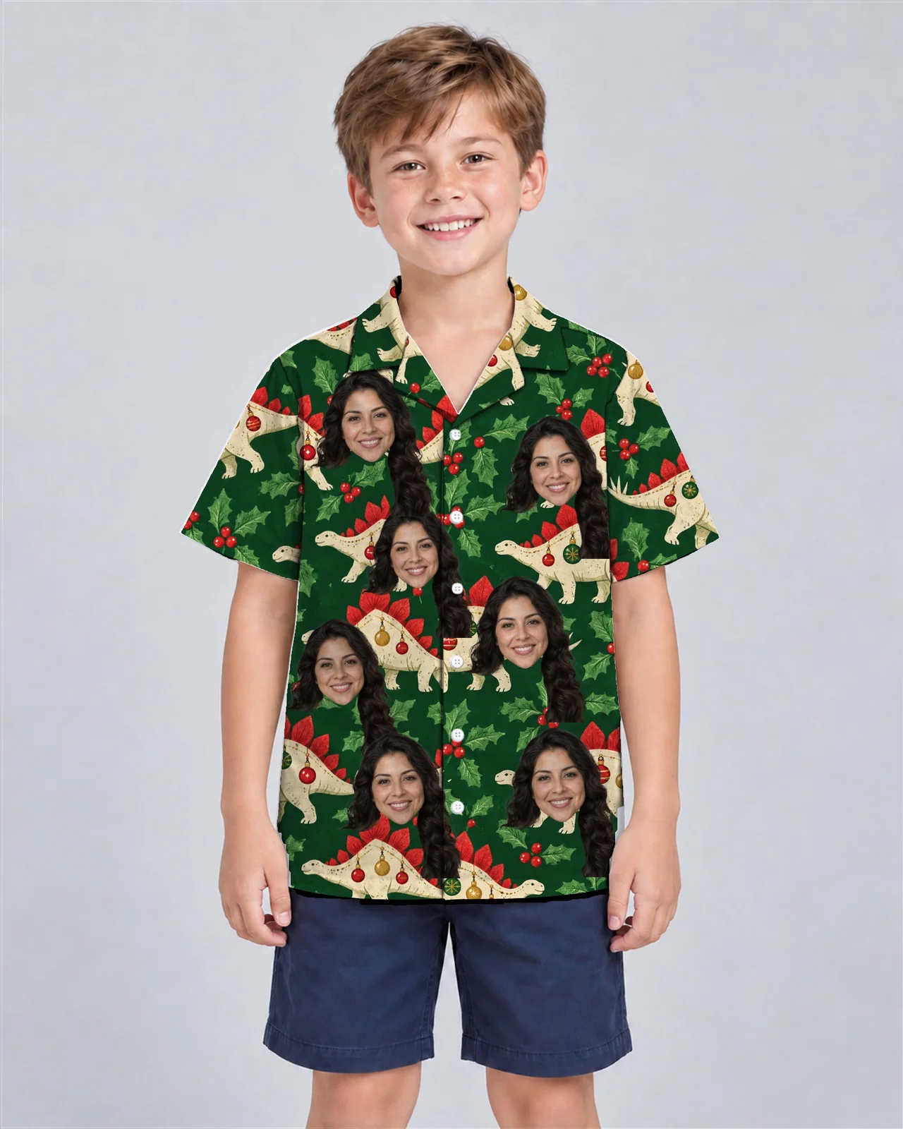Kid wearing the Stegosaurus Ornament Dinosaur Christmas Hawaiian Shirt with custom faces Kid wearing the Stegosaurus Ornament Dinosaur Christmas Hawaiian Shirt with custom faces