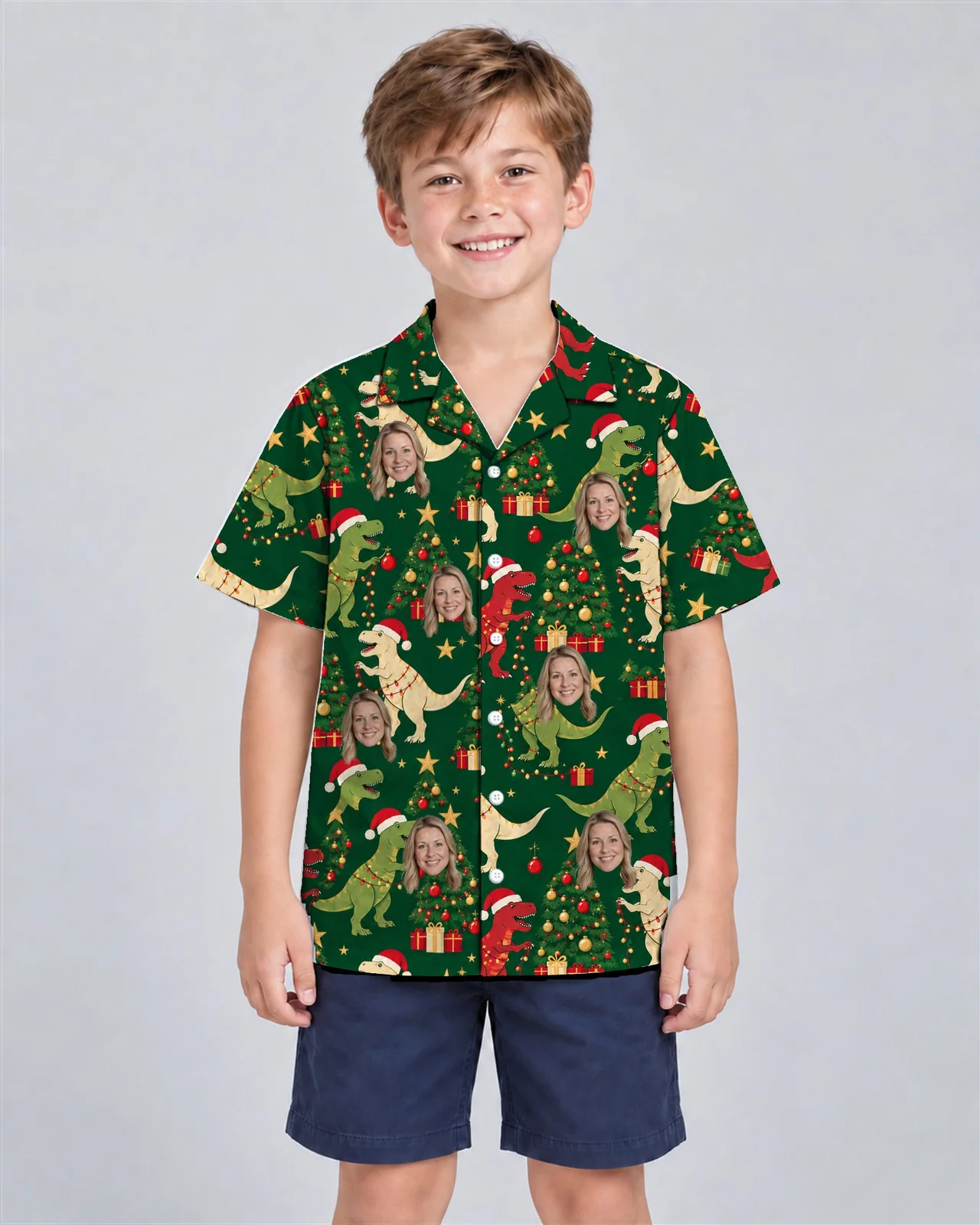Kid wearing the Tree Rex Dinosaur Christmas Hawaiian Shirt with custom faces Kid wearing the Tree Rex Dinosaur Christmas Hawaiian Shirt with custom faces