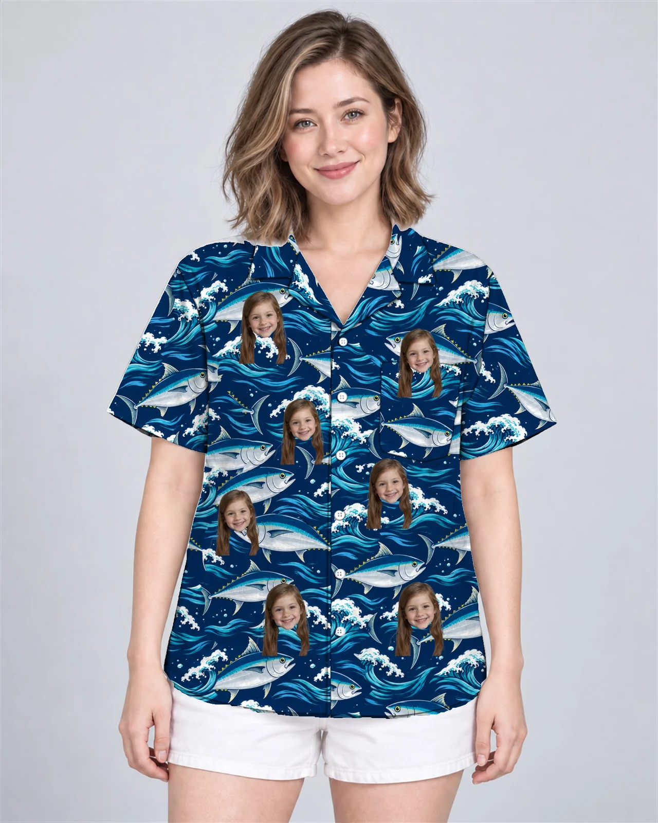 Woman wearing the Tuna Waves Fishing Hawaiian Shirt with custom faces Woman wearing the Tuna Waves Fishing Hawaiian Shirt with custom faces